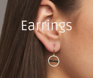 Earrings by Nicole van der Wolf